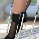 Instrument for putting on compression stockings and tights