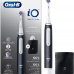 Oral-B toothbrush  white and black + cover